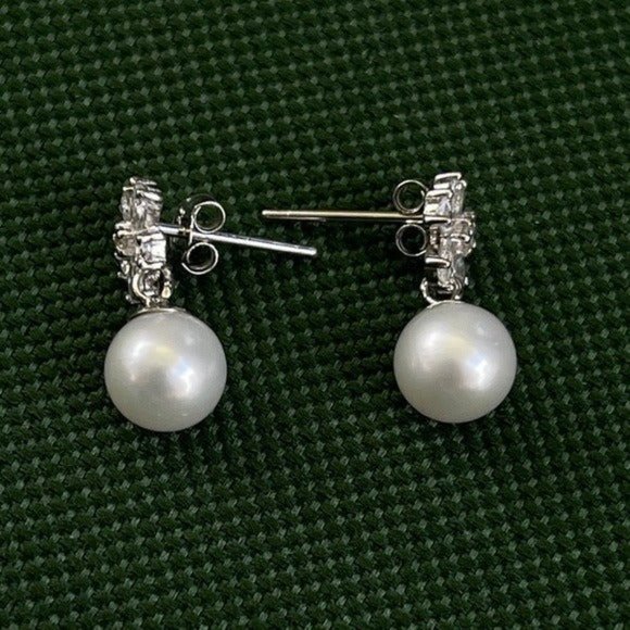 925S Flower Shape Stud Earrings With Round Natural Pearl And Zirconia - Picture 10 of 16